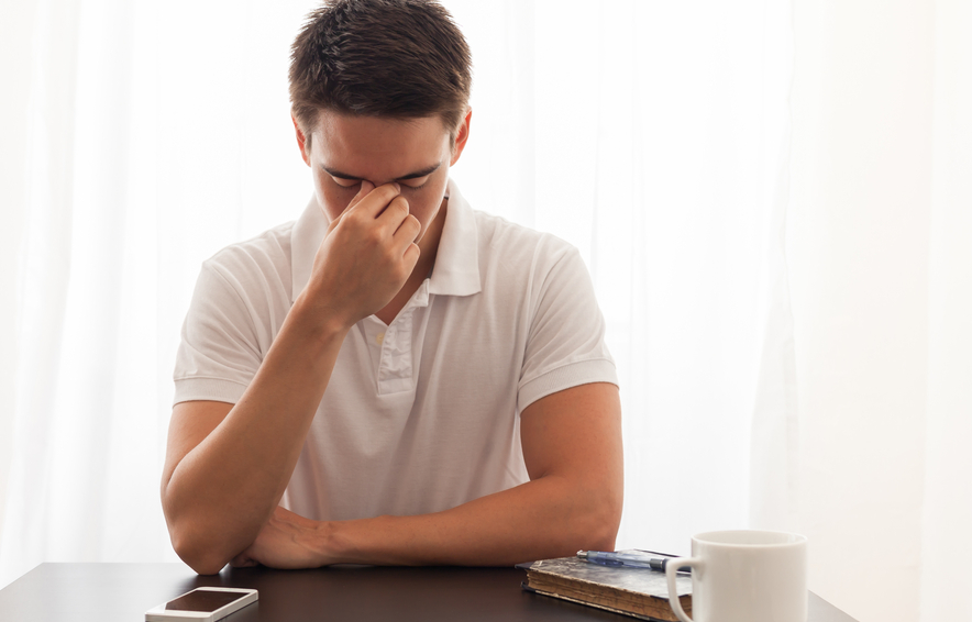 man-stressed-out-from-being-charged-with-domestic-assault